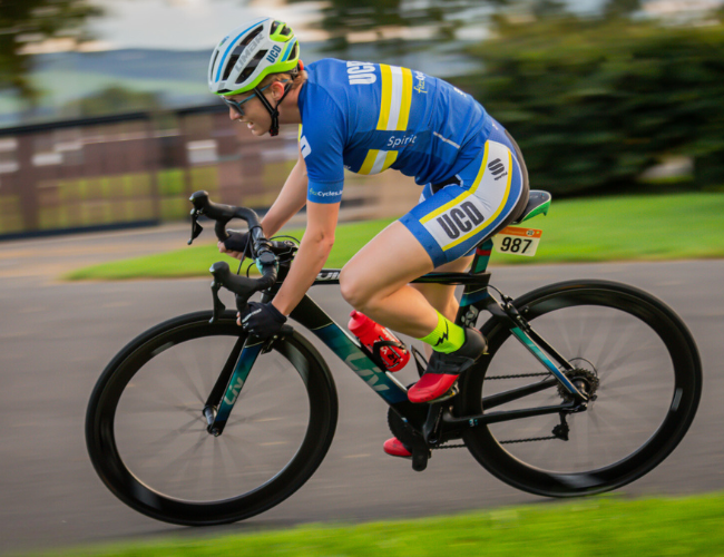 Cycling club member on their bike